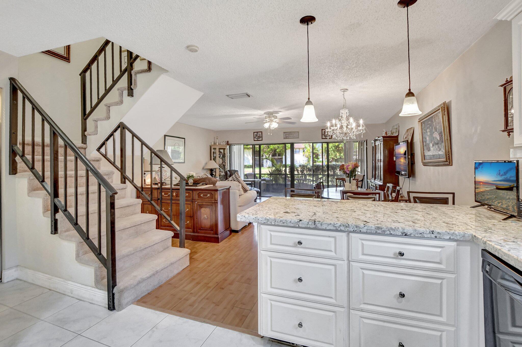 23359 Southwest 55th Way, Unit H Boca Raton, FL 33433 - Photo 12 of 41 Open Kitchen to dining and living room