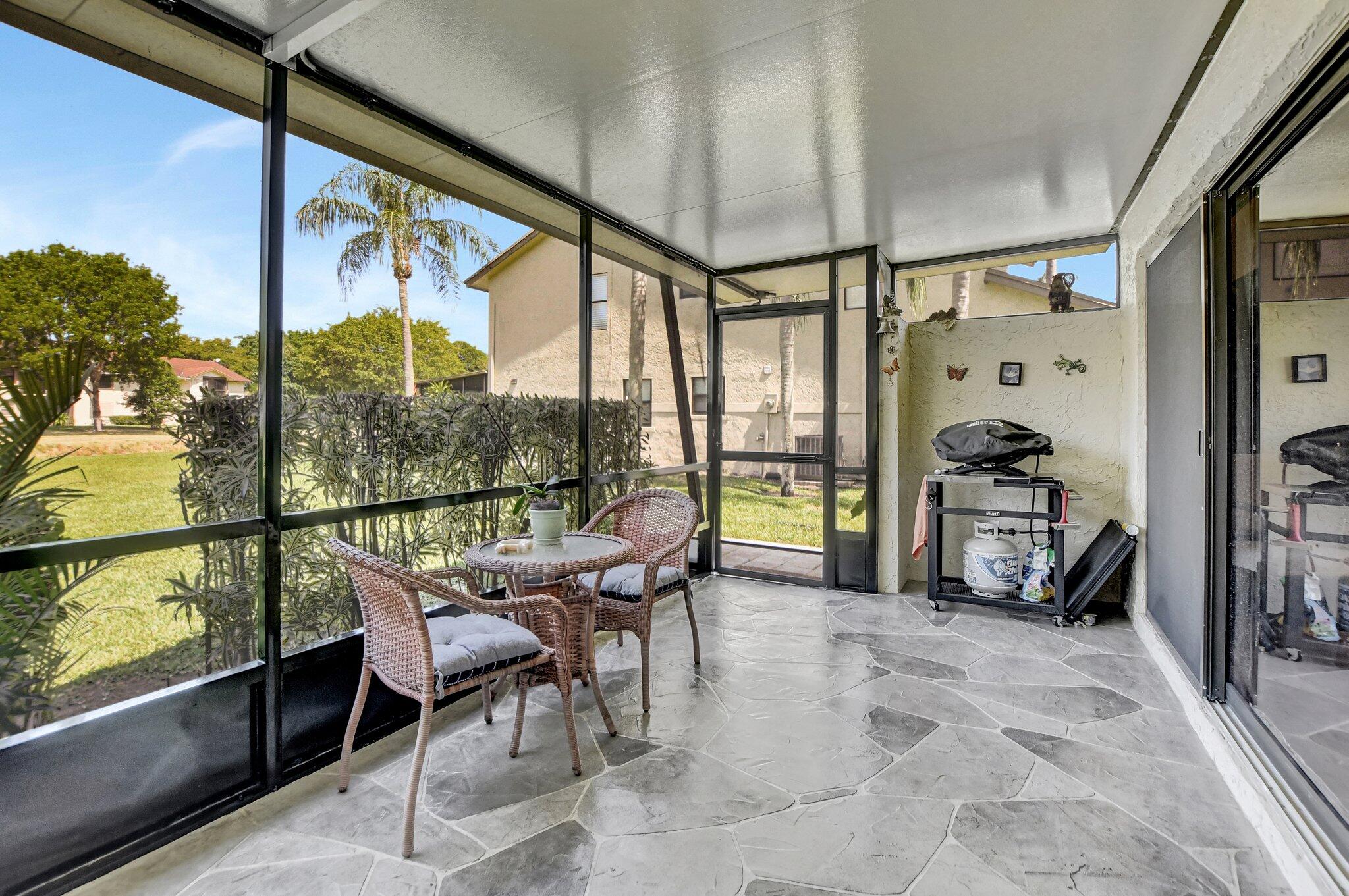 23359 Southwest 55th Way, Unit H Boca Raton, FL 33433 - Photo 31 of 41 outdoor patio 2