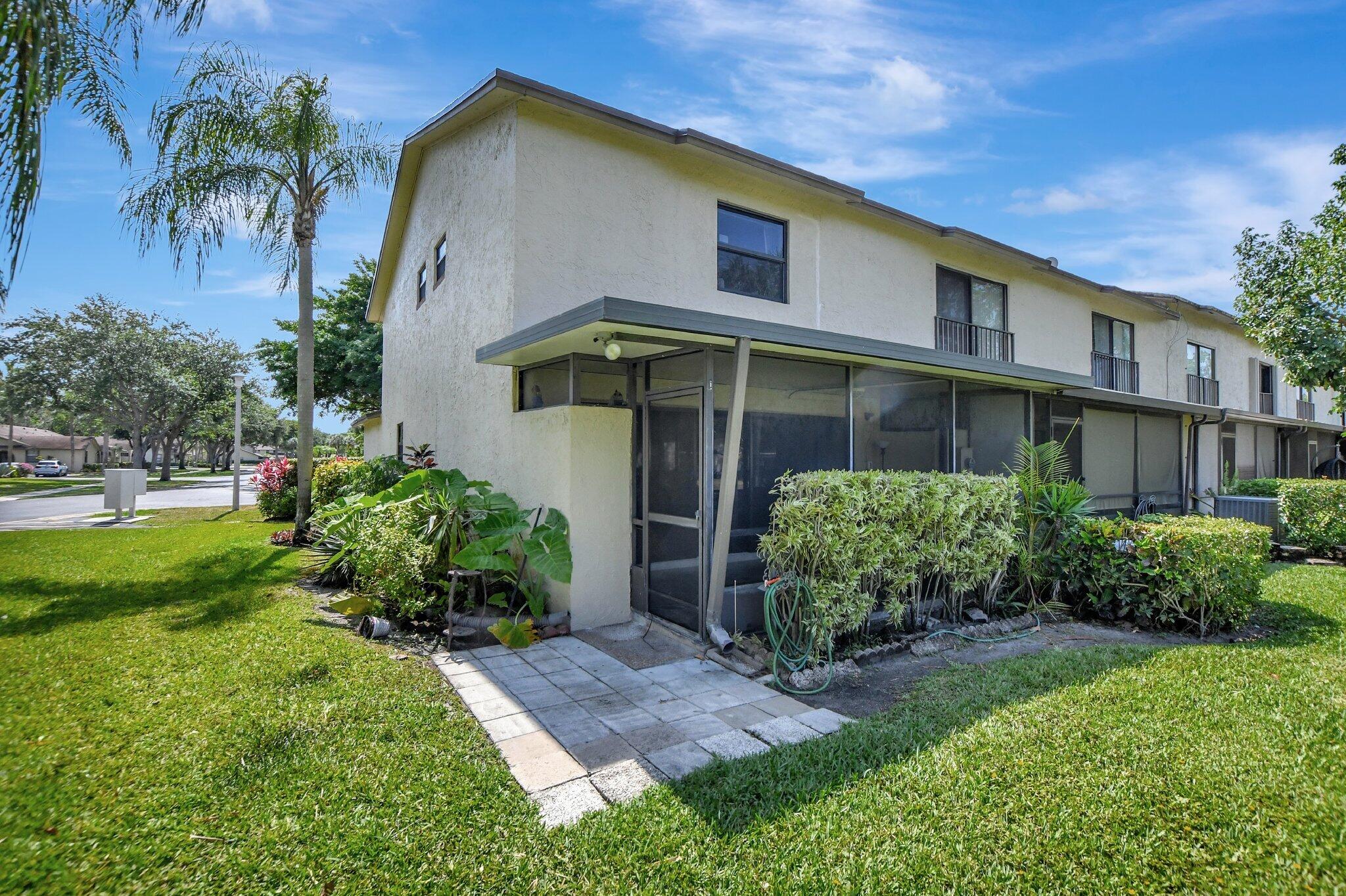 23359 Southwest 55th Way, Unit H Boca Raton, FL 33433 - Photo 32 of 41 back patio view