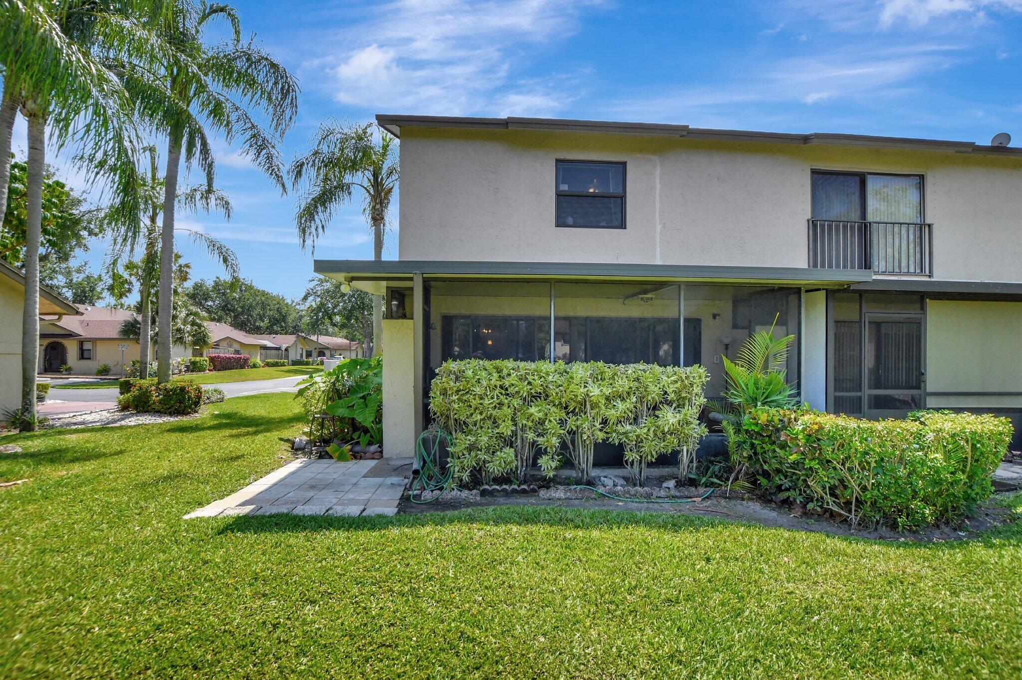 23359 Southwest 55th Way, Unit H Boca Raton, FL 33433 - Photo 34 of 41 back patio rear - Copy
