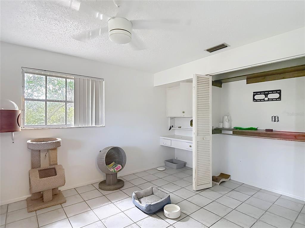 5433 Front Drive Holiday, FL 34690 - Photo 28 of 68 a bathroom with a toilet sink and tub