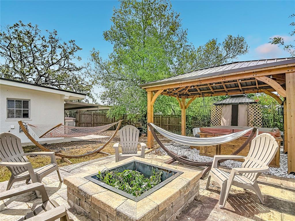5433 Front Drive Holiday, FL 34690 - Photo 55 of 68 a view of a patio with iron fence