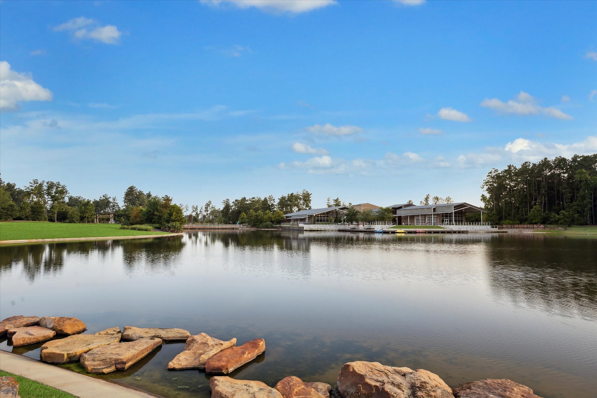 17355 Camillia Trail Conroe, TX 77302 - Photo 32 of 34 a lake view with a large trees around