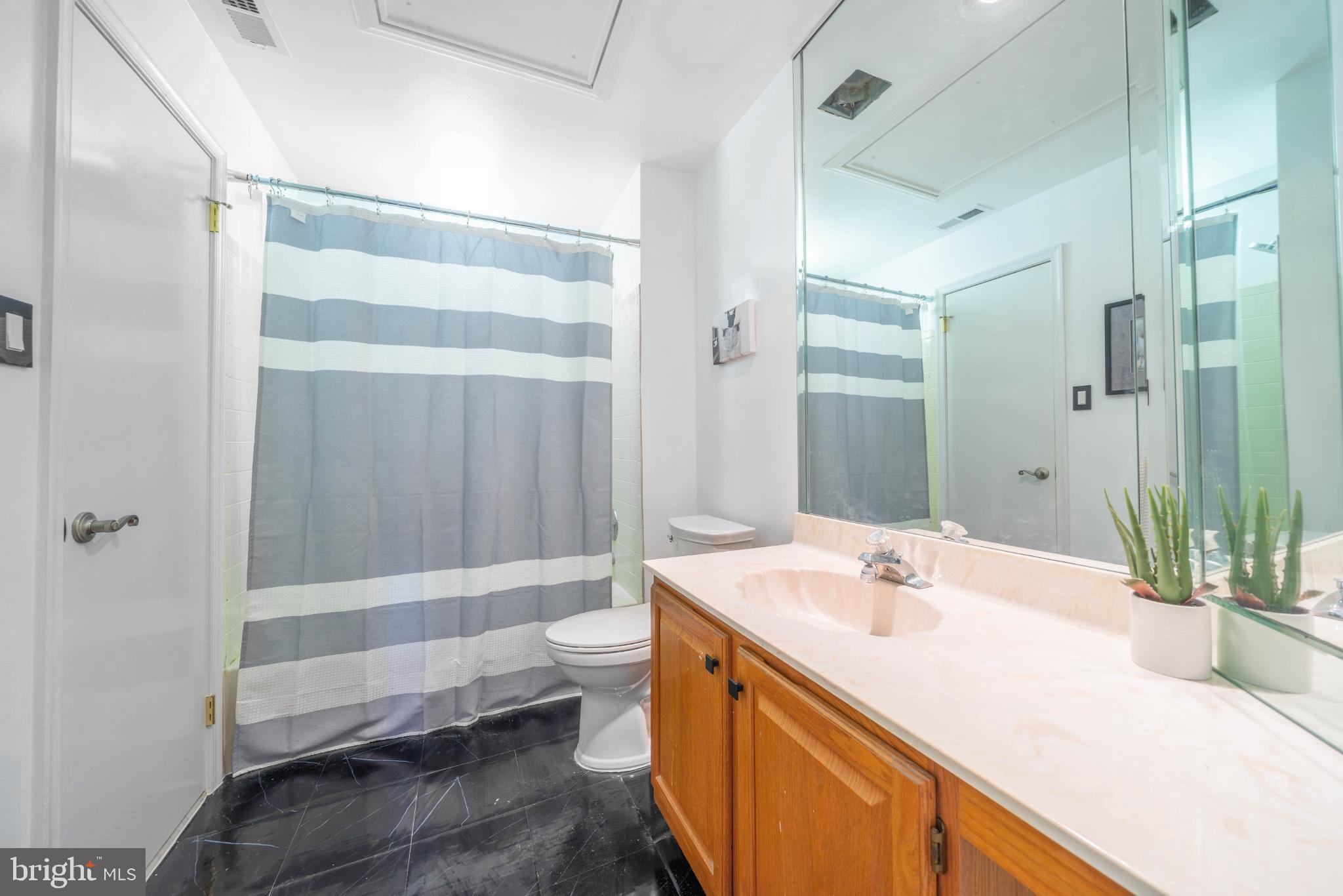 3604B Chadbury Road Mount Laurel, NJ 08054 - Photo 17 of 28 a bathroom with a tub sink and mirror