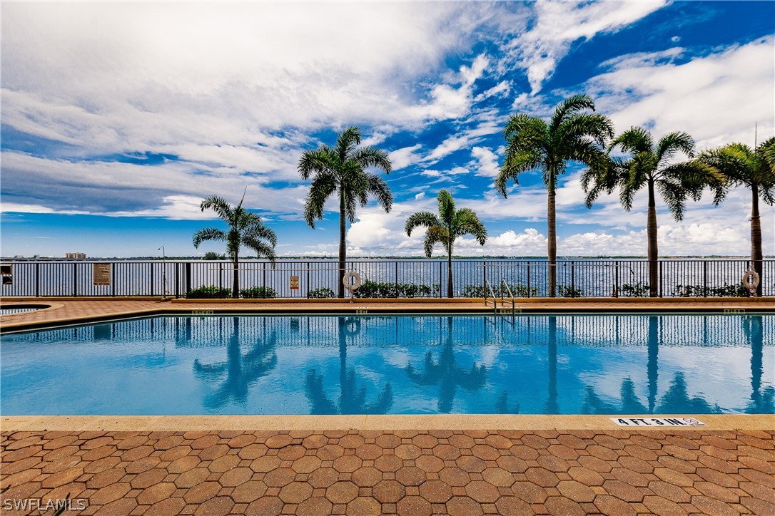 2797 First Street, Unit 403 Fort Myers, FL 33916 - Photo 28 of 33 a view of swimming pool with outdoor seating