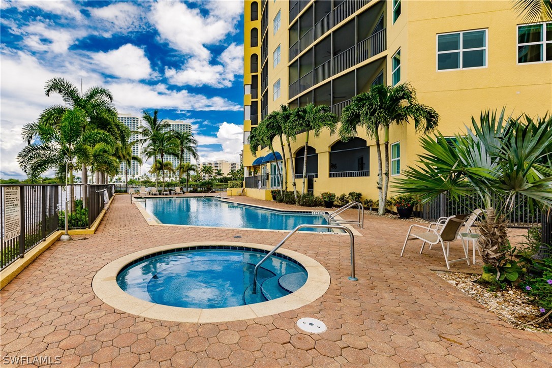 2797 First Street, Unit 403 Fort Myers, FL 33916 - Photo 3 of 33 a view of outdoor space swimming pool and furniture
