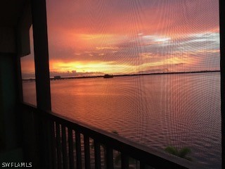 2797 First Street, Unit 403 Fort Myers, FL 33916 - Photo 32 of 33 a view of a lake from a balcony