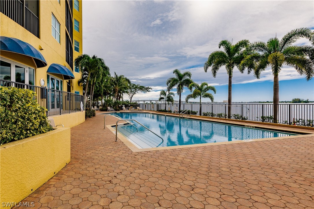 2797 First Street, Unit 403 Fort Myers, FL 33916 - Photo 4 of 33 a view of swimming pool with outdoor seating