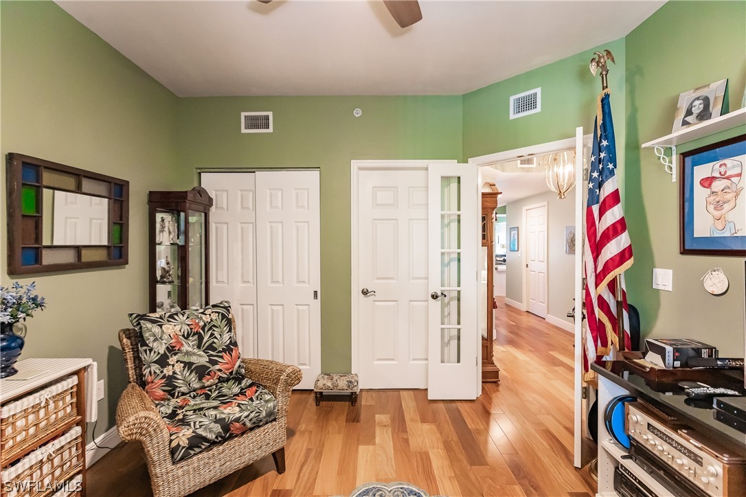 2797 First Street, Unit 403 Fort Myers, FL 33916 - Photo 10 of 33 a living room with furniture and a flat screen tv