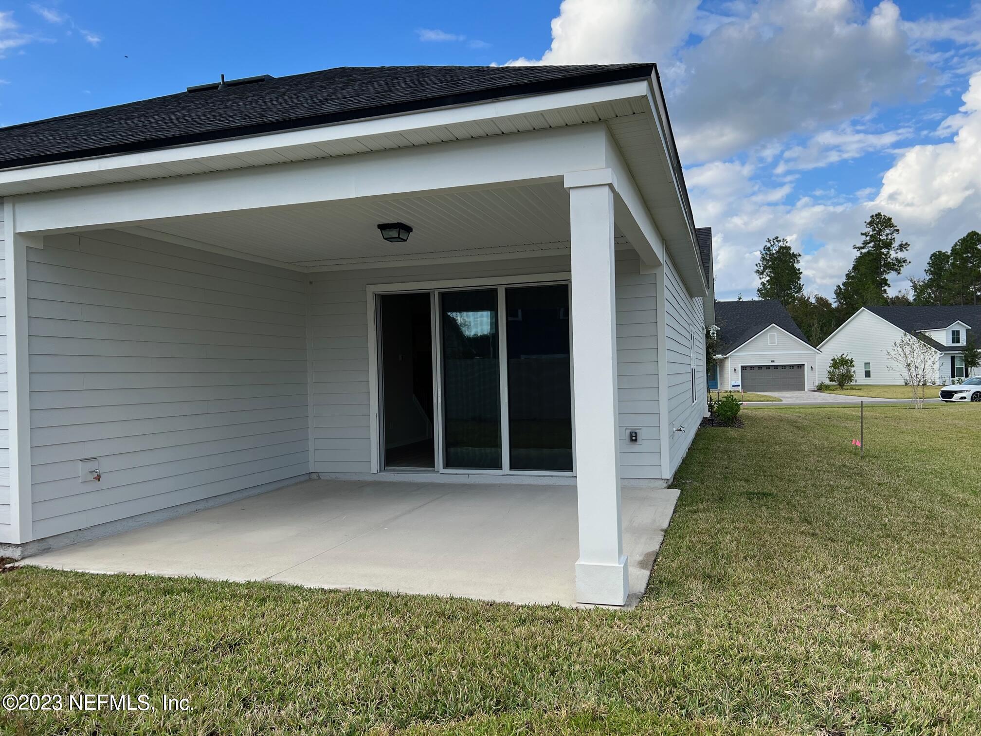 63 Yardley Ct Street St. Augustine, FL 32092 - Photo 17 of 54 a view of a house with backyard