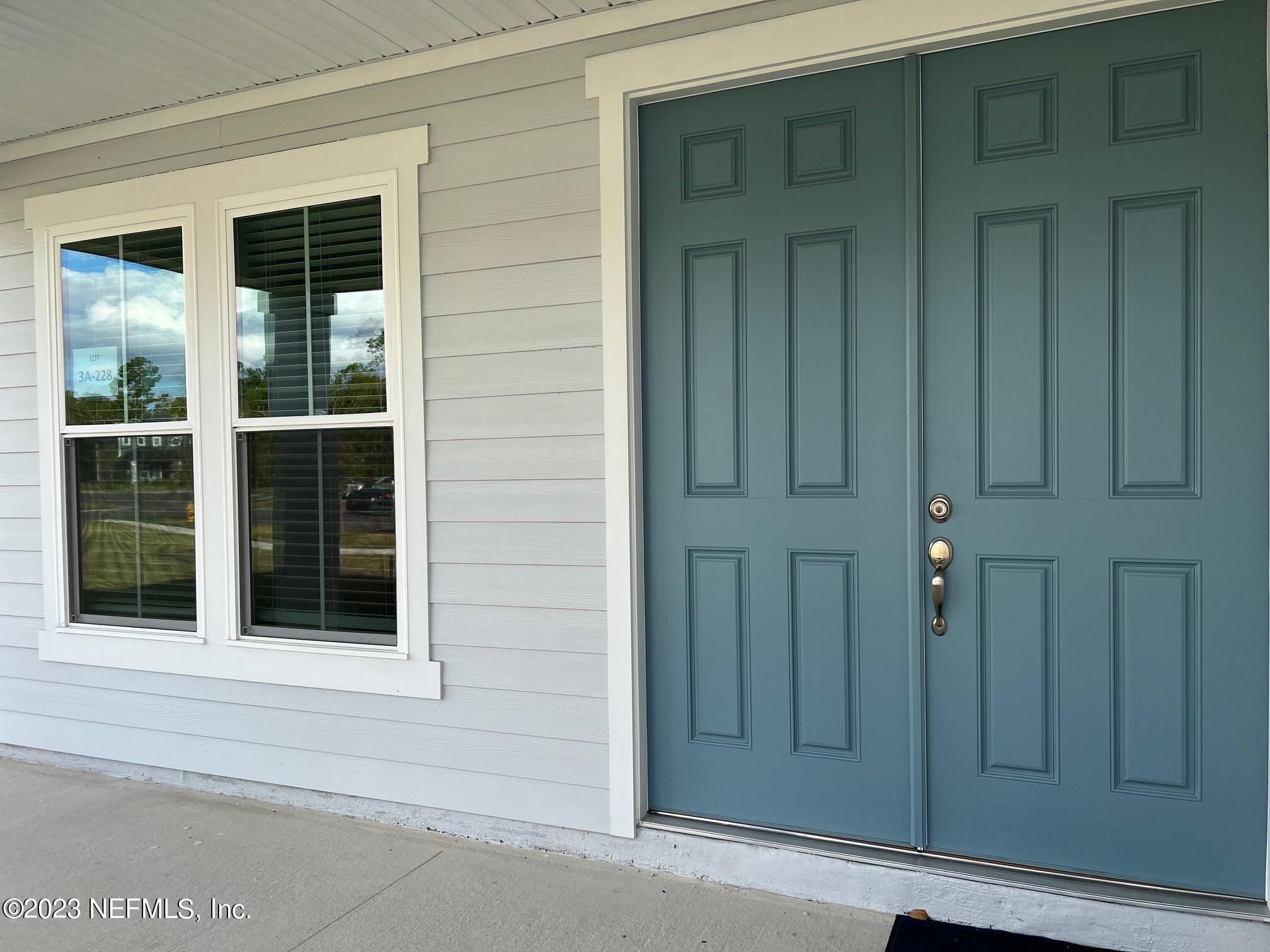 63 Yardley Ct Street St. Augustine, FL 32092 - Photo 2 of 54 a view of front door
