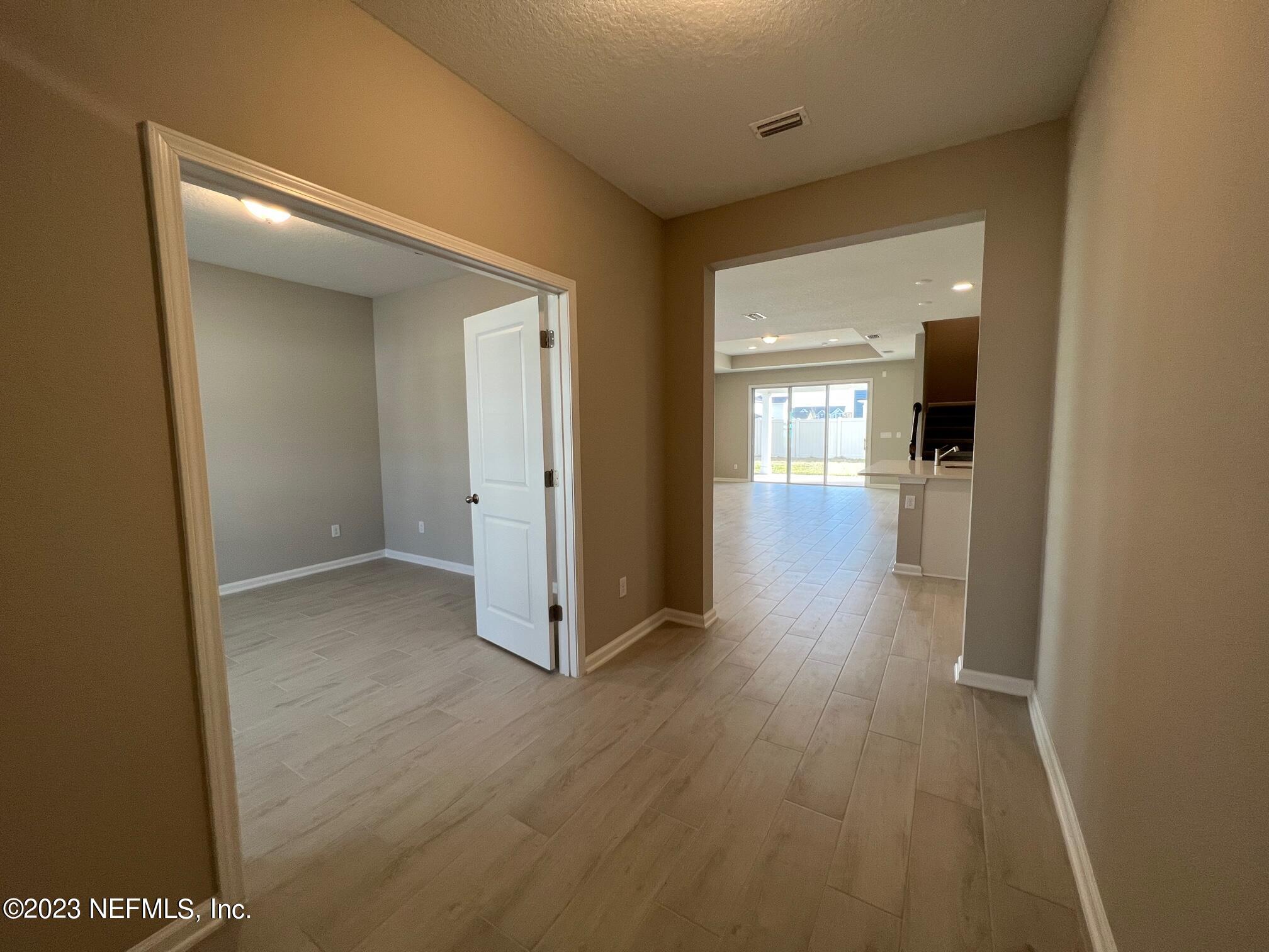 63 Yardley Ct Street St. Augustine, FL 32092 - Photo 3 of 54 wooden floor in a gallery