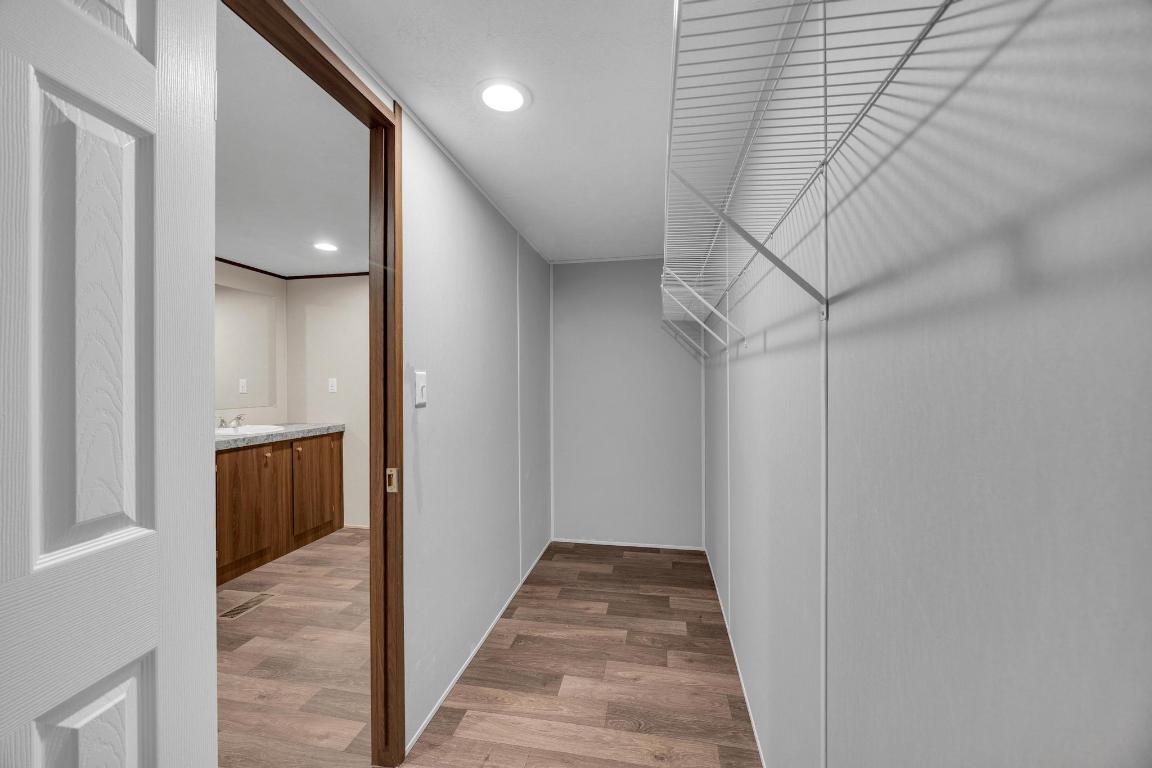 Tbd Overhill Road Bastrop, TX 78602 - Photo 14 of 37 a view of a hallway with wooden floor and entryway