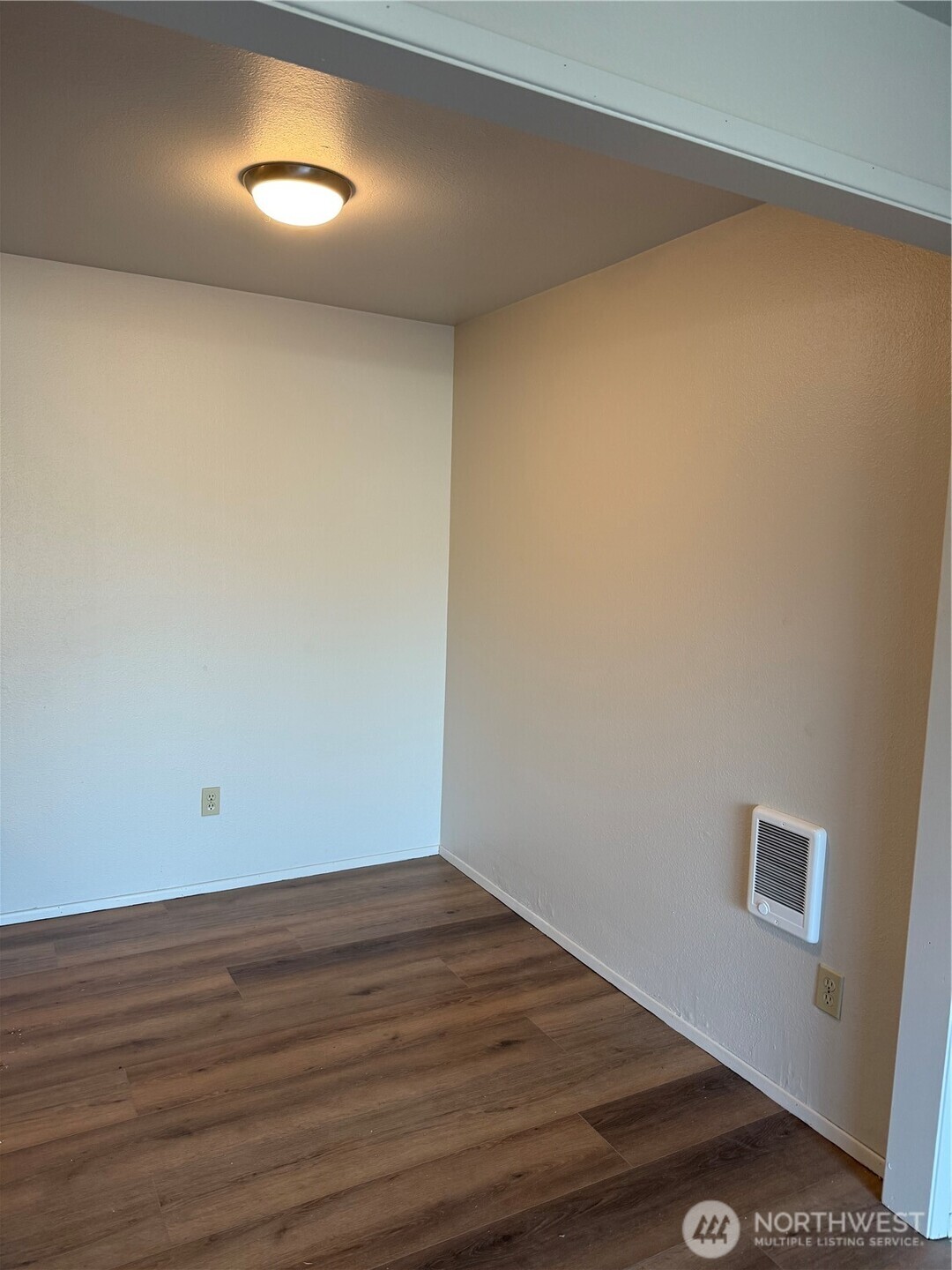 1111 West Market Street Aberdeen, WA 98520 - Photo 11 of 40 a view of empty room with wooden floor and fan