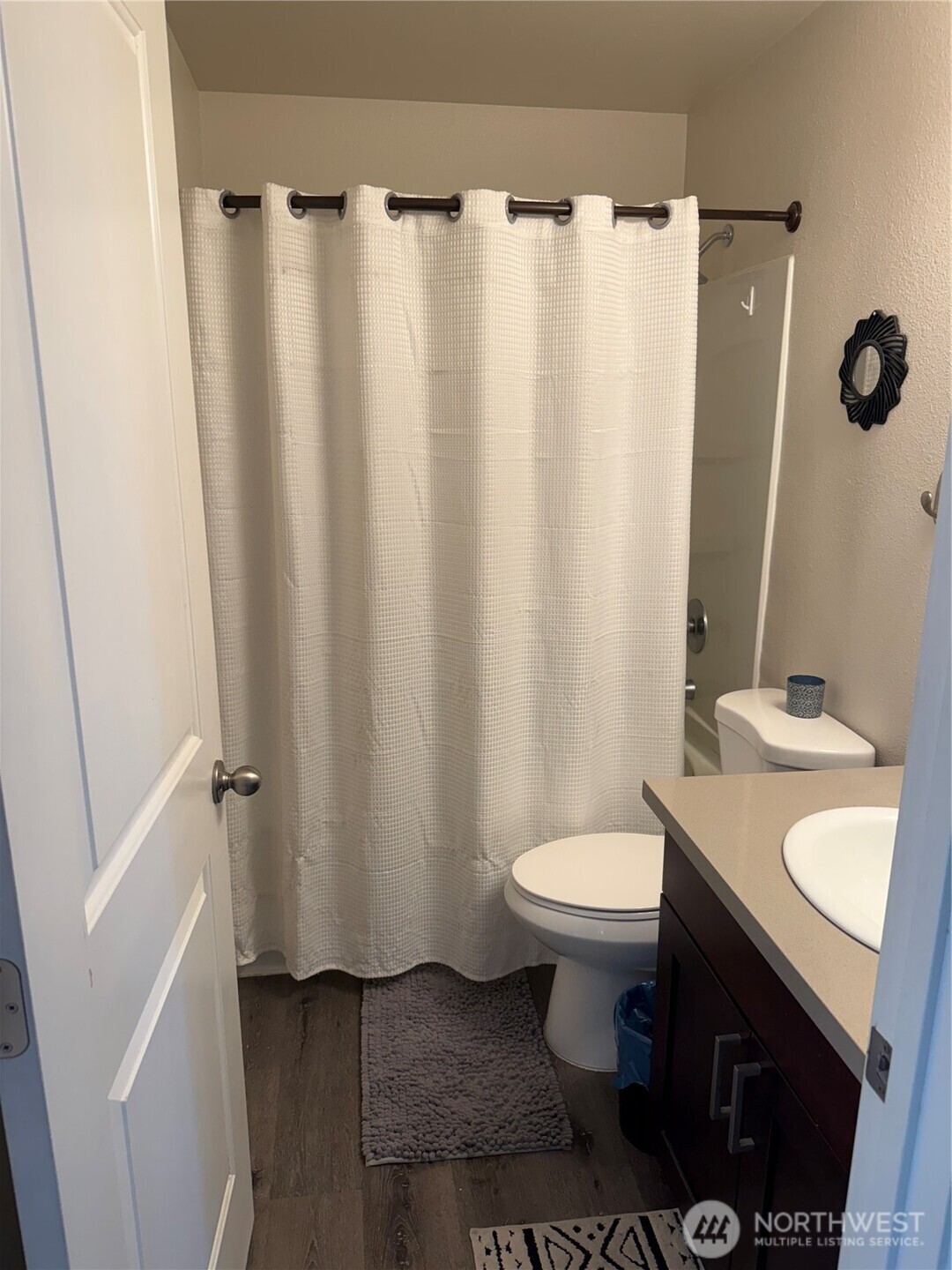 1111 West Market Street Aberdeen, WA 98520 - Photo 31 of 40 a bathroom with a sink toilet and shower