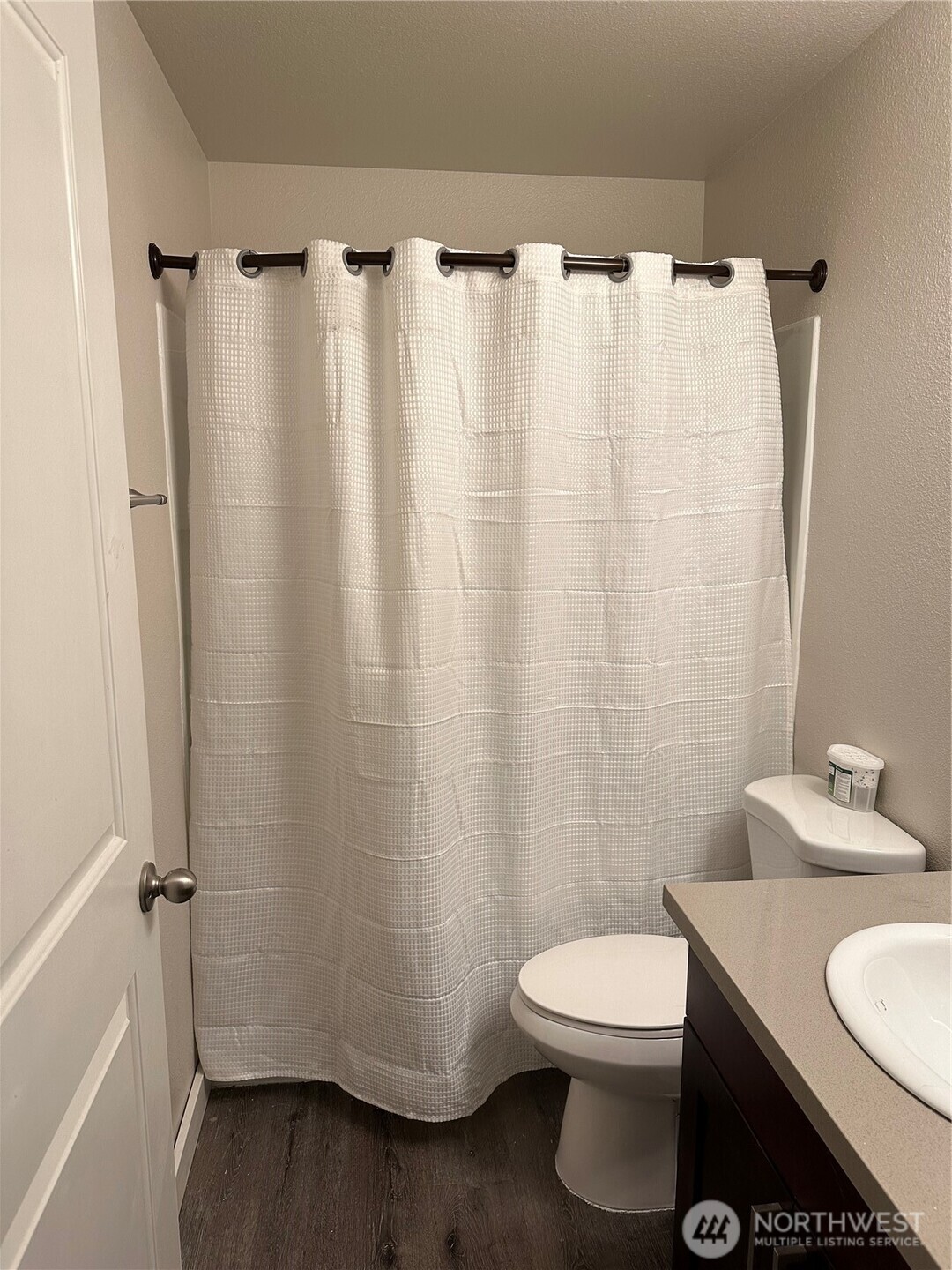 1111 West Market Street Aberdeen, WA 98520 - Photo 34 of 40 a bathroom with a sink a toilet and shower
