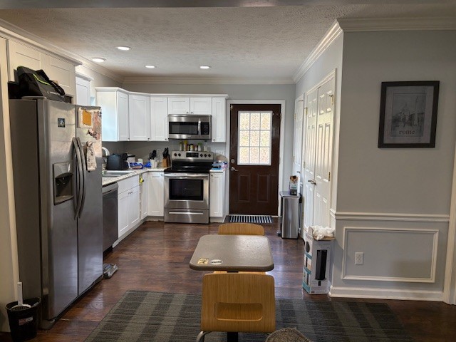 125 McGinness Avenue Carthage, TN 37030 - Photo 18 of 28 a kitchen with stainless steel appliances granite countertop a refrigerator and a stove top oven