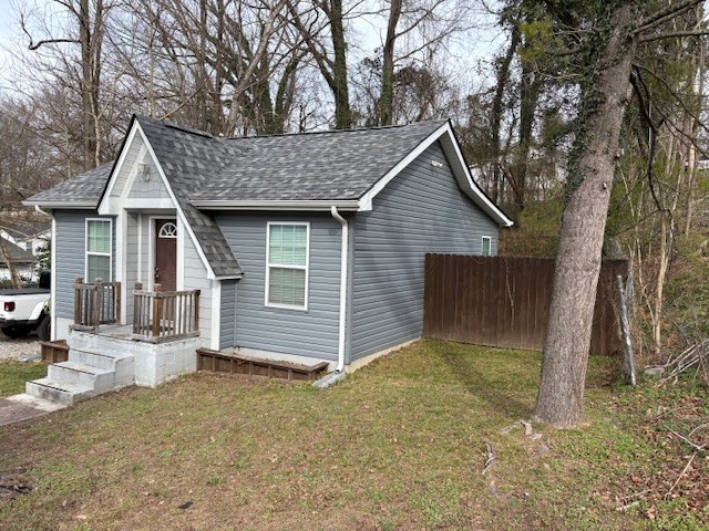125 McGinness Avenue Carthage, TN 37030 - Photo 19 of 28 a view of a house with a yard and large tree