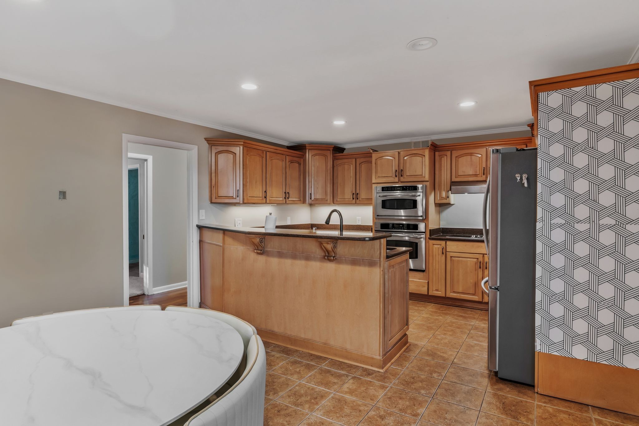 4 Hidden Acres Lebanon, TN 37087 - Photo 18 of 77 a kitchen with stainless steel appliances granite countertop a refrigerator stove top oven and sink