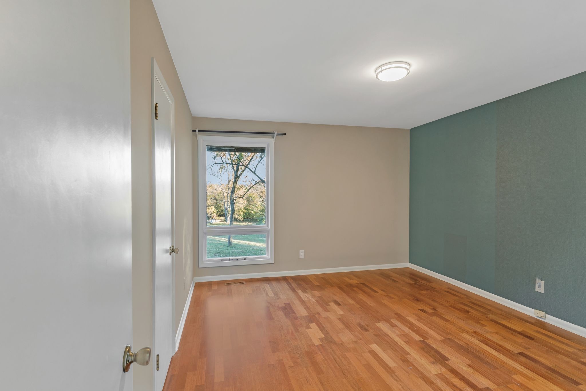 4 Hidden Acres Lebanon, TN 37087 - Photo 40 of 77 an empty room with wooden floor and windows