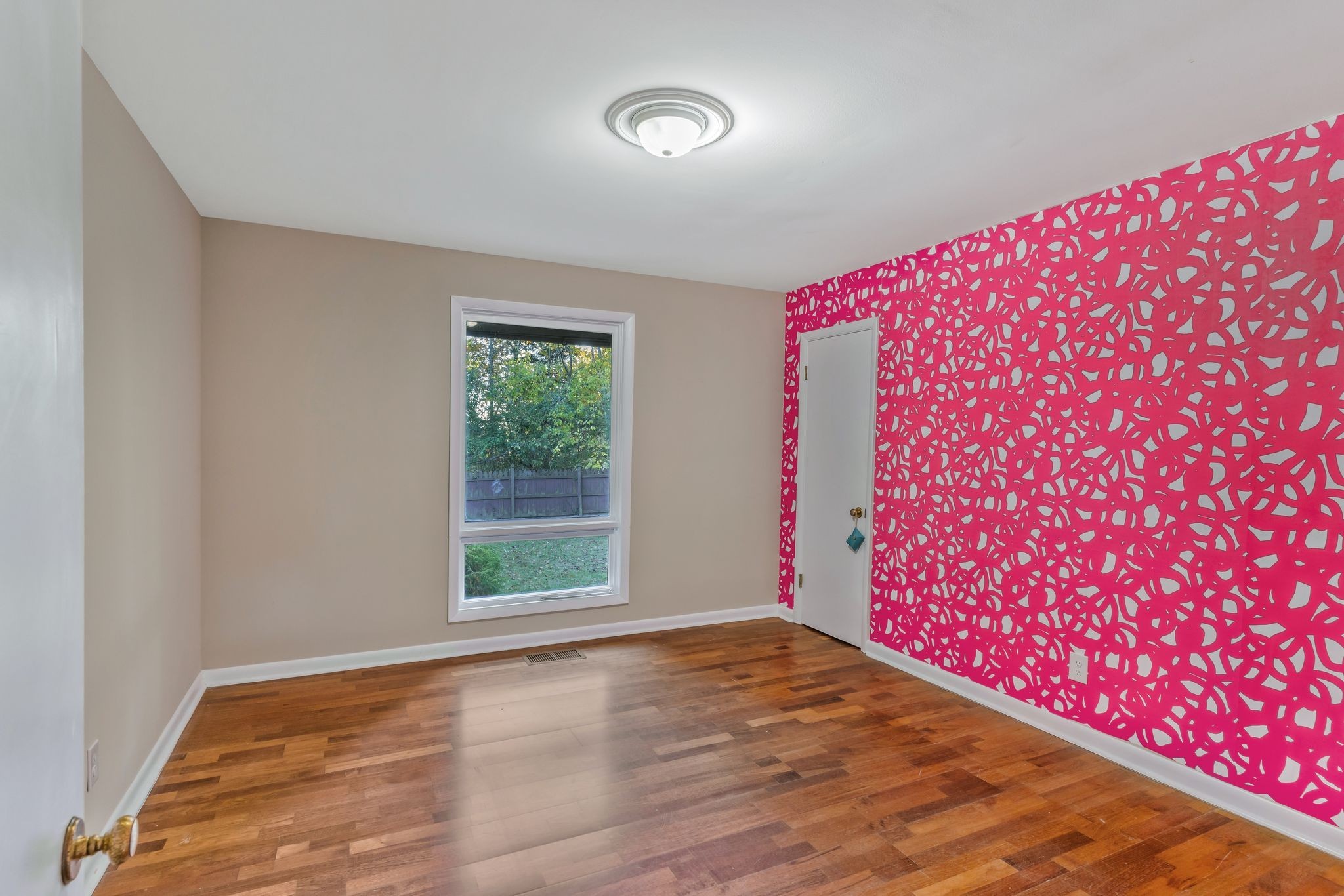 4 Hidden Acres Lebanon, TN 37087 - Photo 46 of 77 a view of an empty room with a window and wooden floor