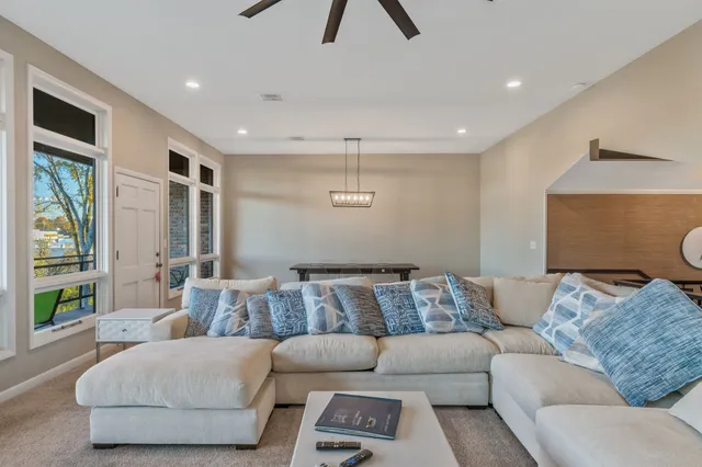 a living room with furniture and a couch