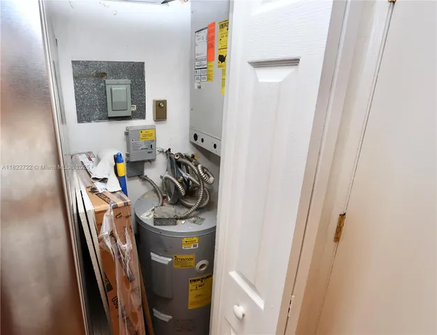 a view of a kitchen with appliances