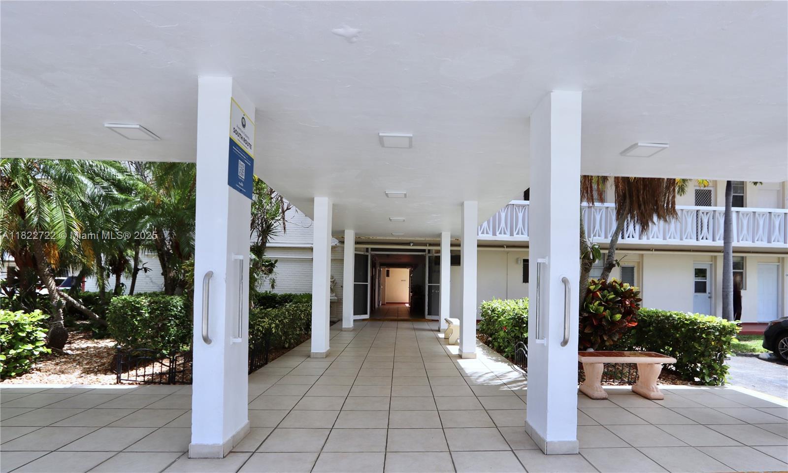 2920 Point E Drive, Unit N208 Aventura, FL 33160 - Photo 29 of 34 a front view of a building with entryway