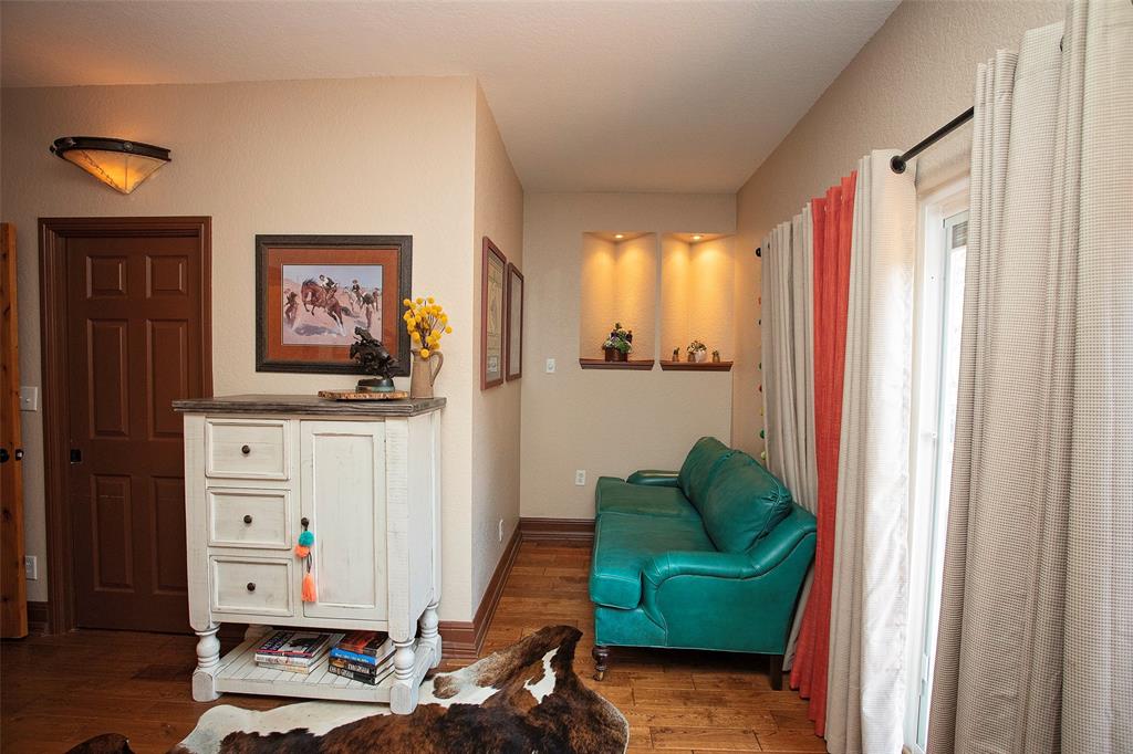 880 Cliffs Drive Graford, TX 76449 - Photo 22 of 40 a living room with furniture and a window