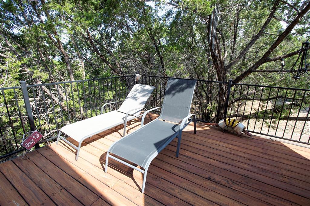 880 Cliffs Drive Graford, TX 76449 - Photo 31 of 40 a view of a patio with wooden floor