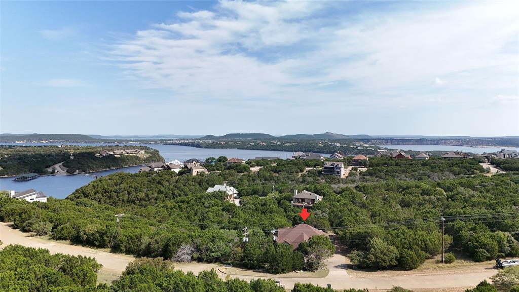 880 Cliffs Drive Graford, TX 76449 - Photo 34 of 40 an aerial view of a city and mountain view in back