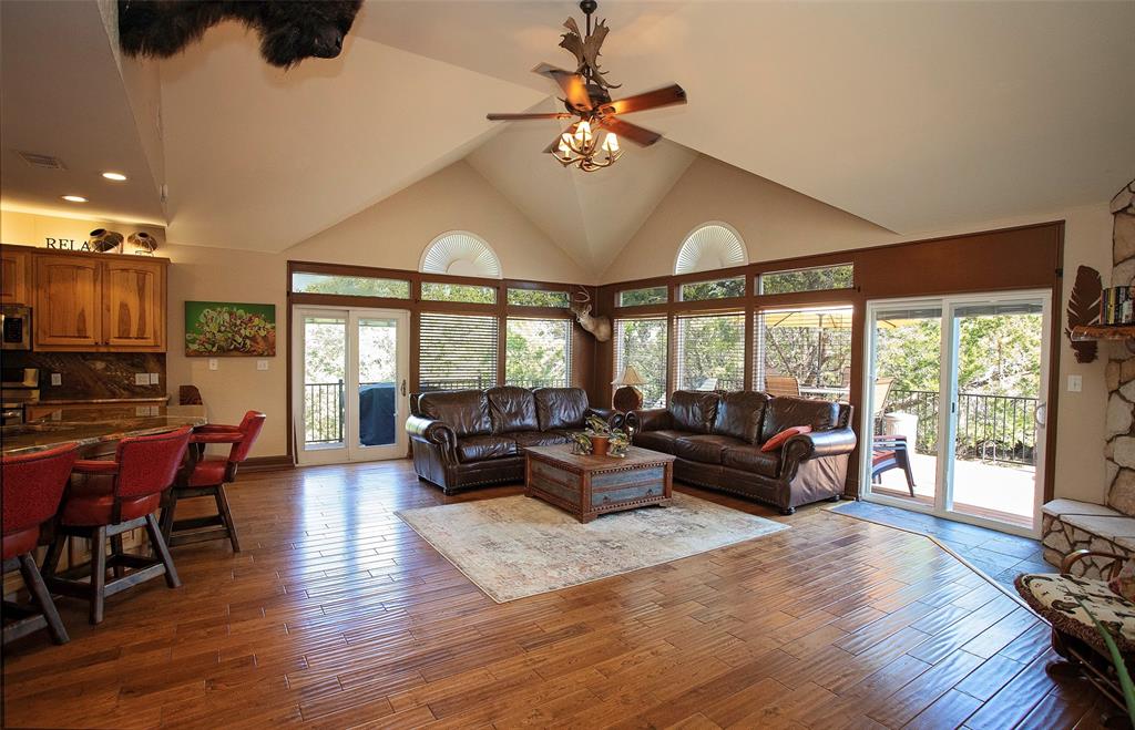 880 Cliffs Drive Graford, TX 76449 - Photo 10 of 40 a living room with furniture and a large window