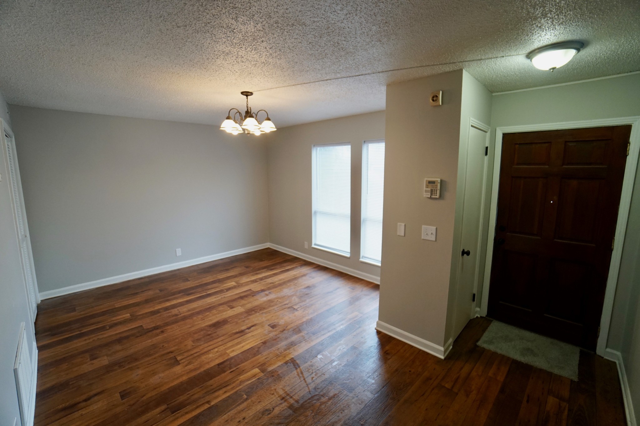 500 Paragon Mills Road, Unit B7 Nashville, TN 37211 - Photo 3 of 9 wooden floor in an empty room with a window