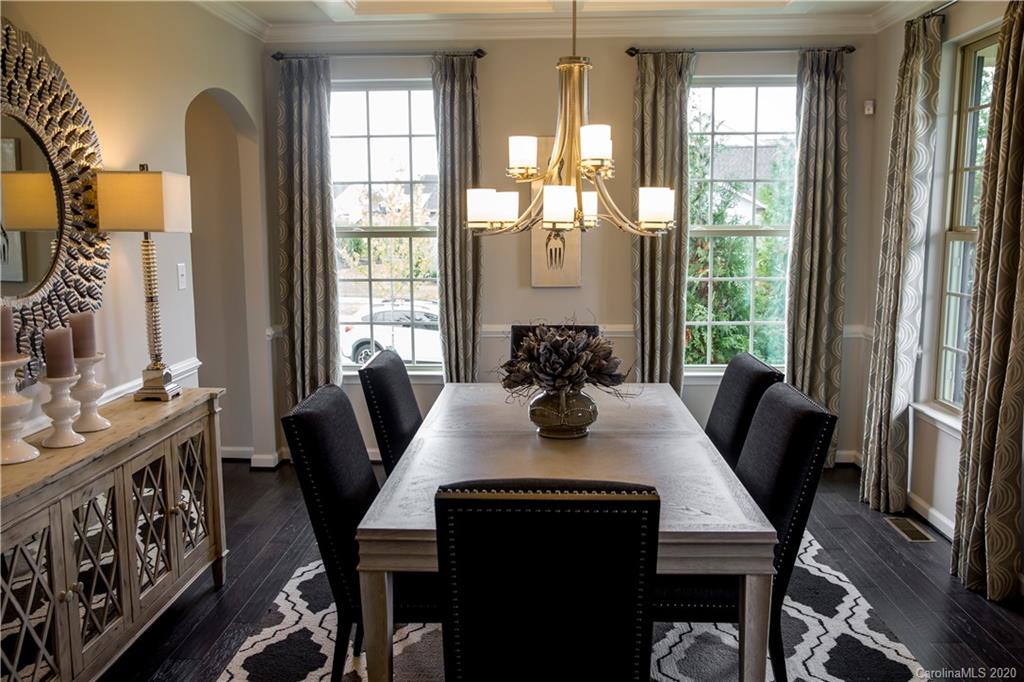 7123 Messina Road, Unit 130 Indian Land, SC 29707 - Photo 10 of 15 a view of a dining room with furniture and window