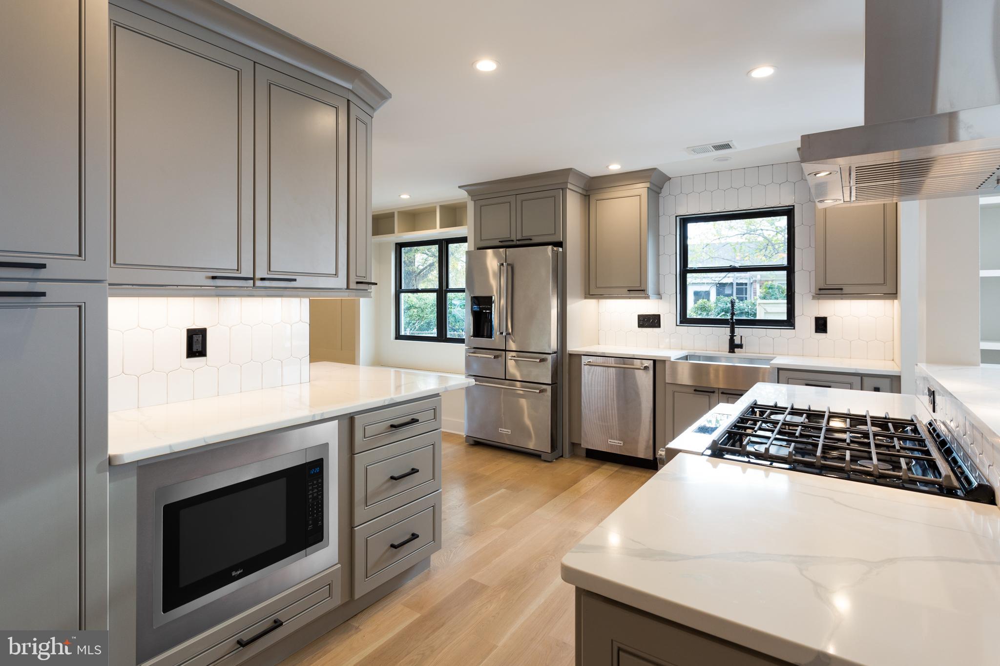 1610 Baltimore Road Alexandria, VA 22308 - Photo 14 of 45 Modern kitchen with sleek cabinetry.