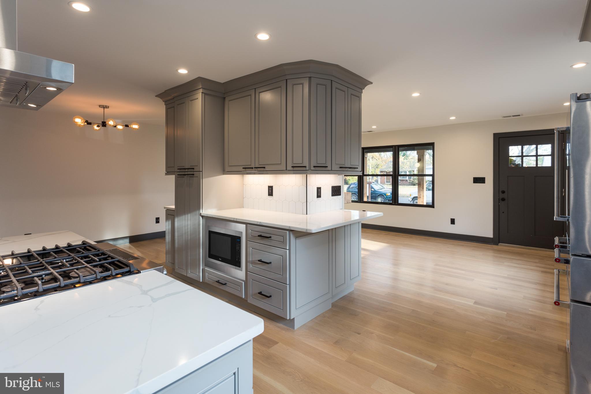 1610 Baltimore Road Alexandria, VA 22308 - Photo 15 of 45 Modern kitchen with sleek cabinetry.