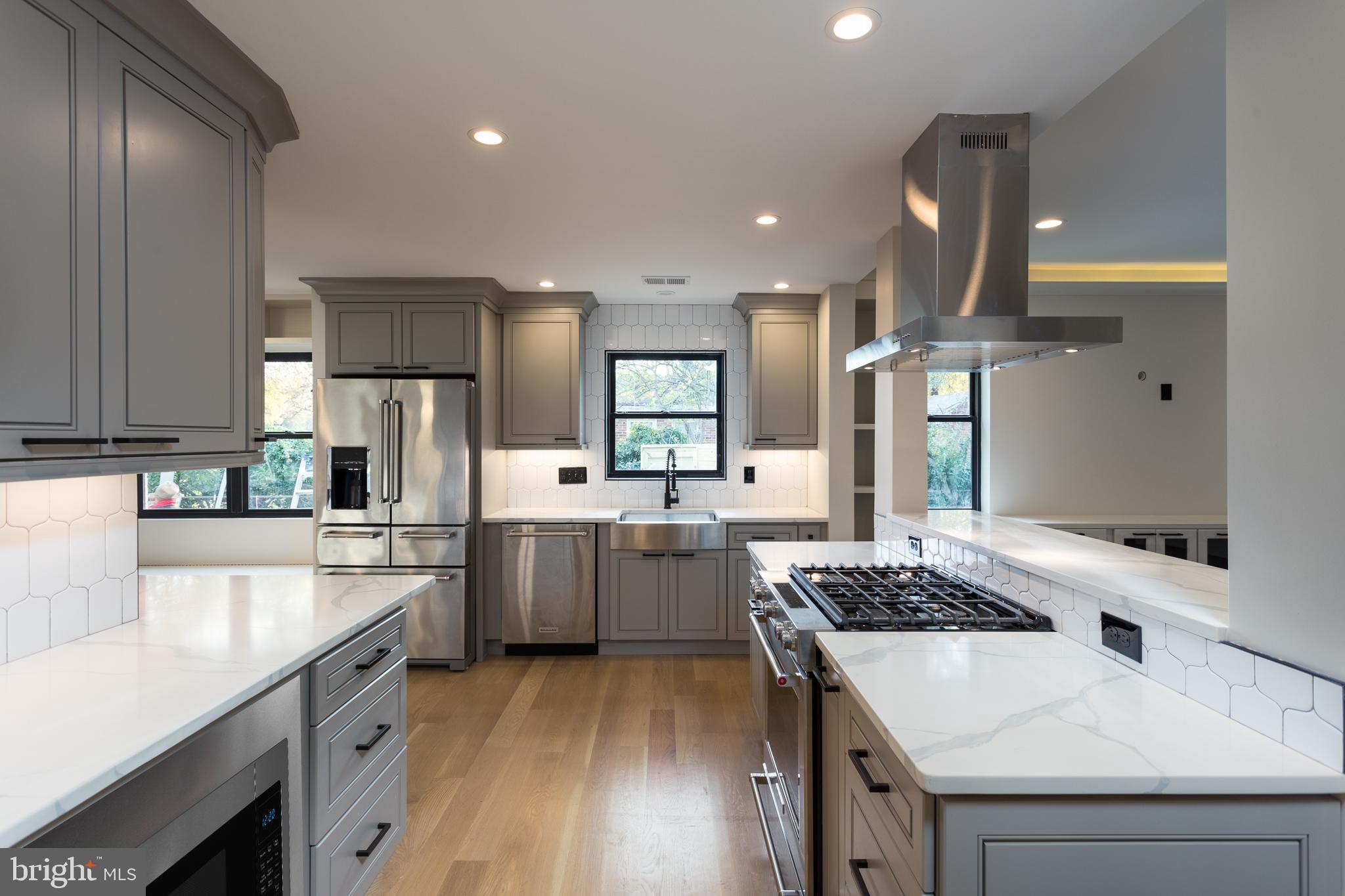 1610 Baltimore Road Alexandria, VA 22308 - Photo 18 of 45 Sleek modern kitchen with elegant finishes.