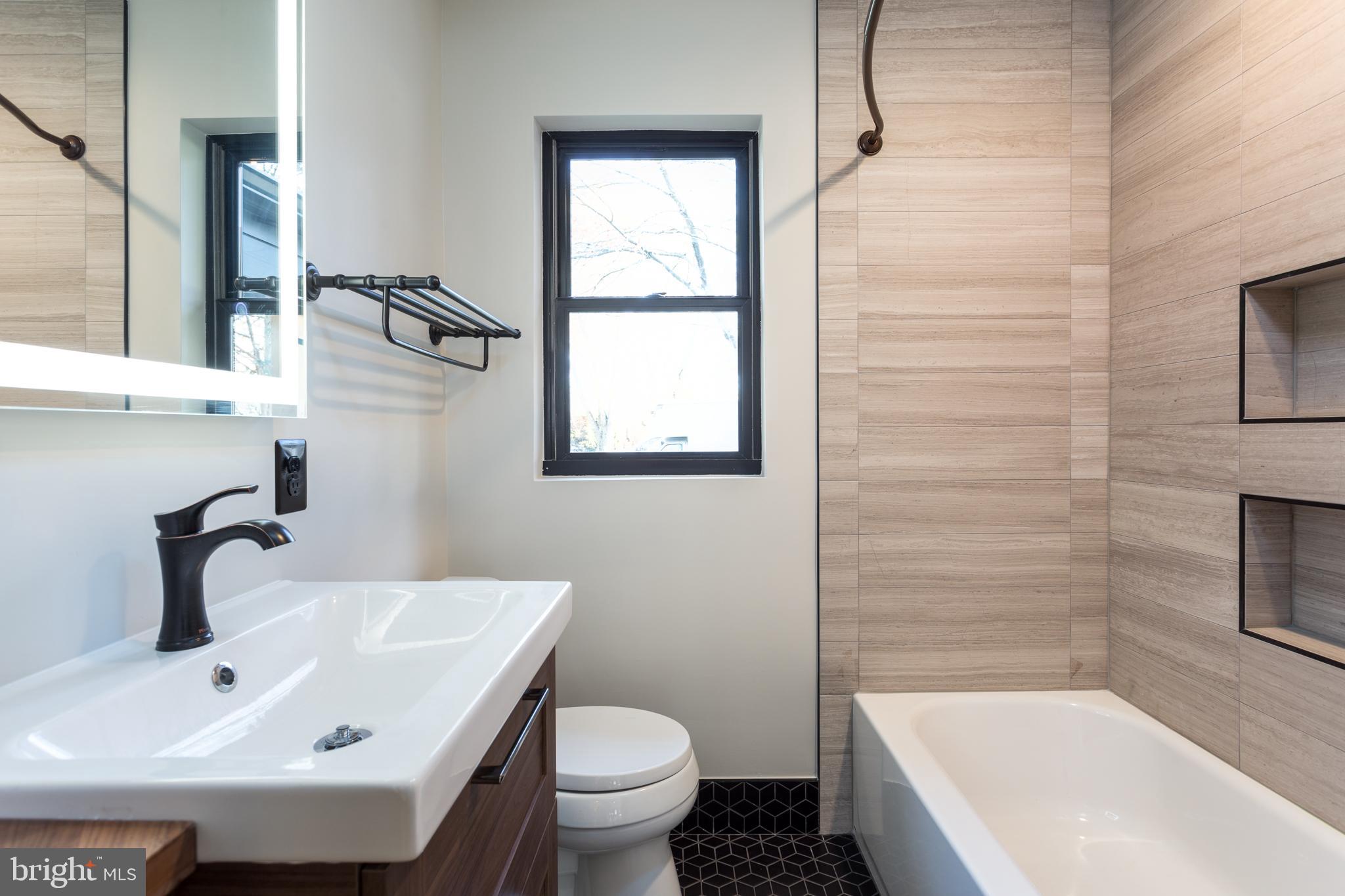 1610 Baltimore Road Alexandria, VA 22308 - Photo 21 of 45 Modern bathroom with sleek design elements.