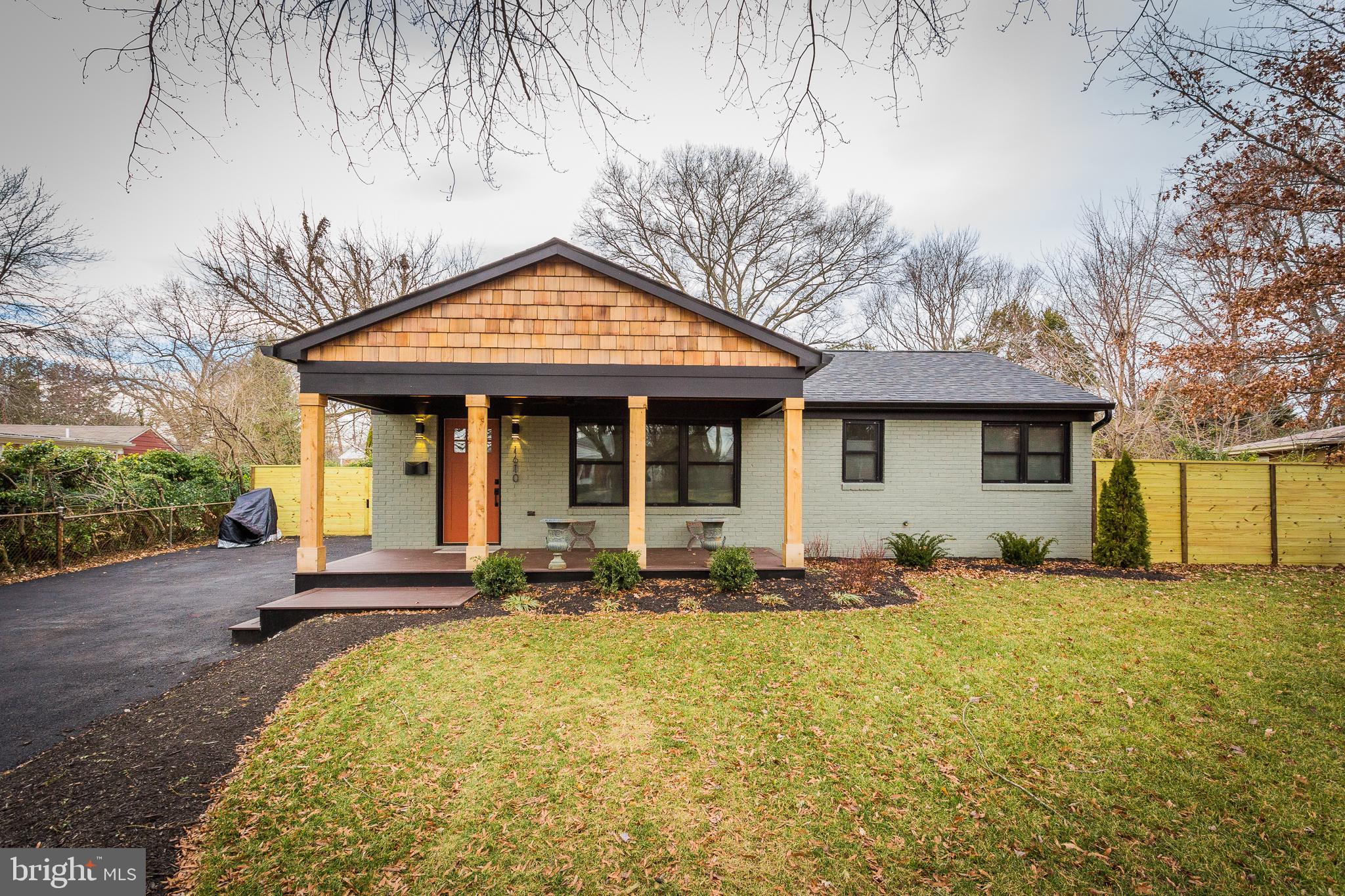 1610 Baltimore Road Alexandria, VA 22308 - Photo 3 of 45 Charming home with inviting porch and greenery.