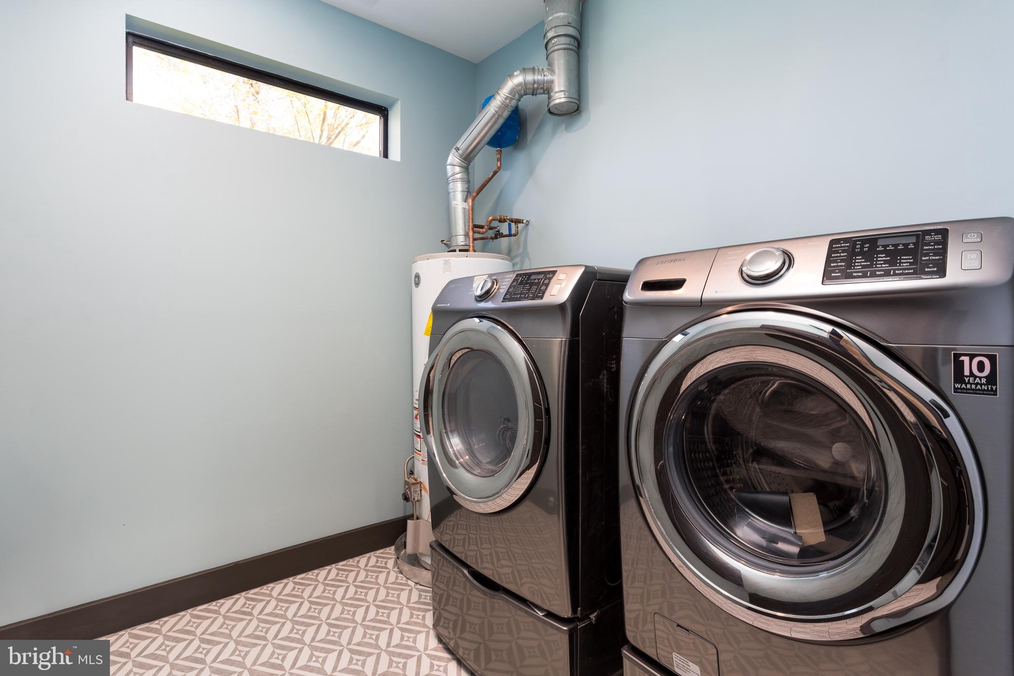 1610 Baltimore Road Alexandria, VA 22308 - Photo 31 of 45 Sleek laundry space with modern appliances.