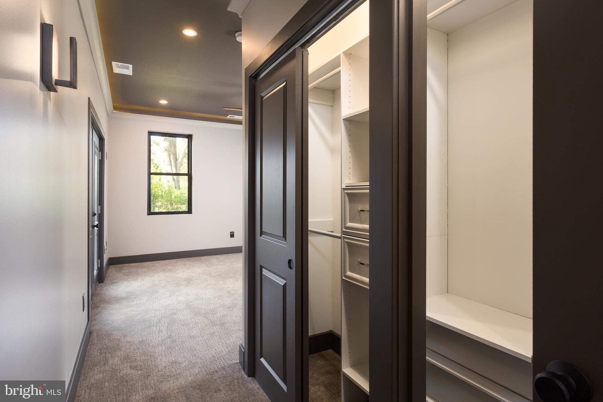 1610 Baltimore Road Alexandria, VA 22308 - Photo 33 of 45 Spacious hallway with stylish closet access.