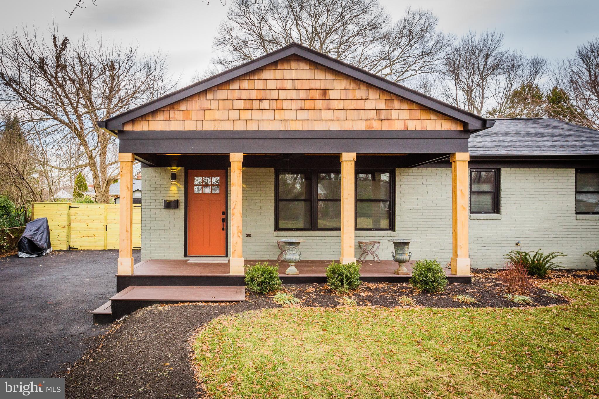 1610 Baltimore Road Alexandria, VA 22308 - Photo 6 of 45 Charming home with inviting porch and greenery.