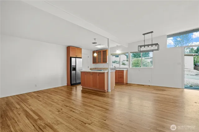a view of kitchen with wooden floor
