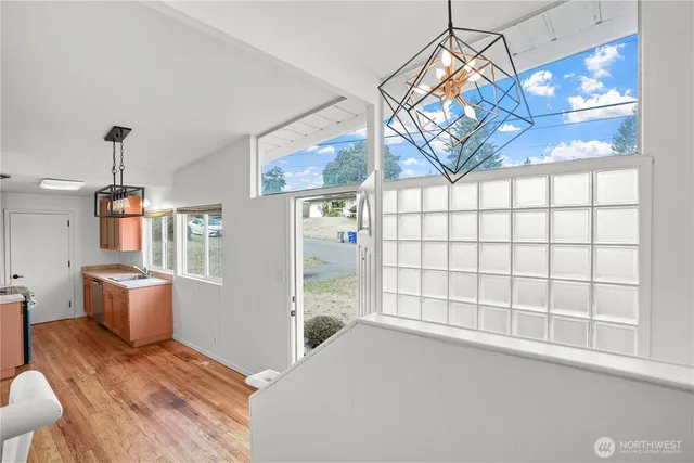 a view of a livingroom with furniture and window