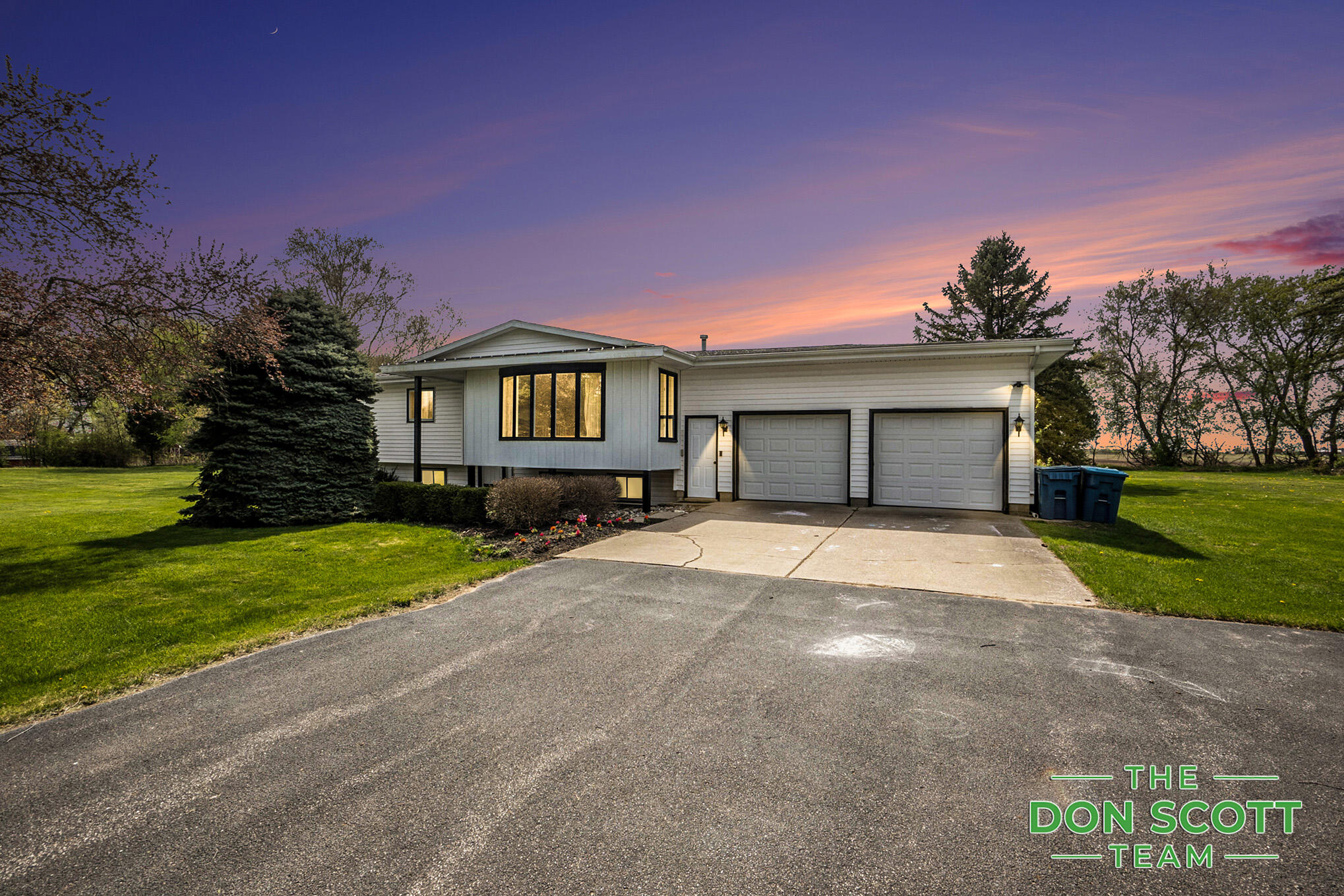 12925 Harrisburg Road Ravenna, MI 49451 - Photo 1 of 26 Front