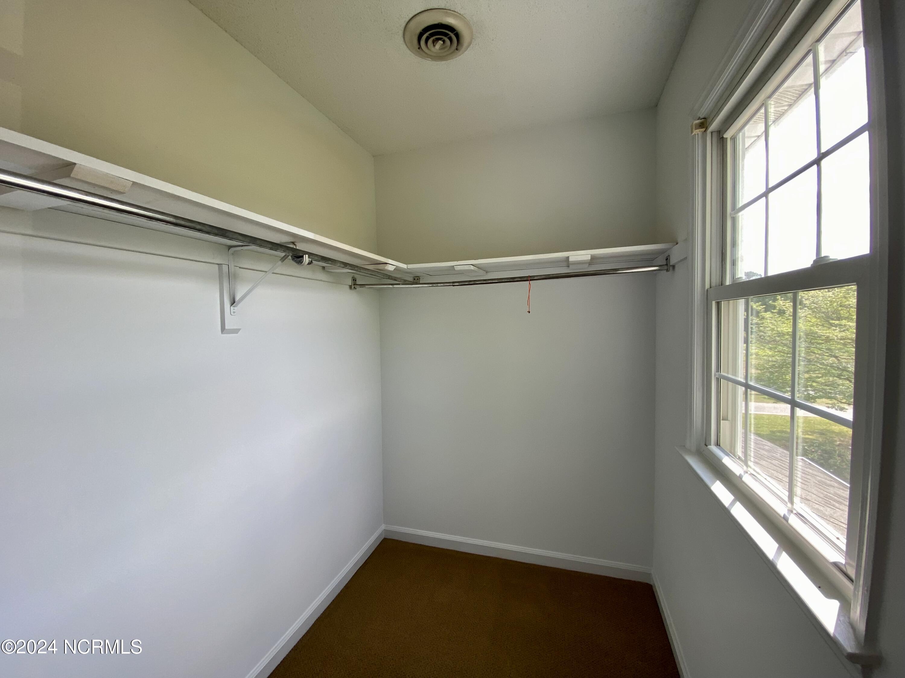 539 Club Knolls Road Dudley, NC 28333 - Photo 31 of 44 Upstairs Walk in Closet