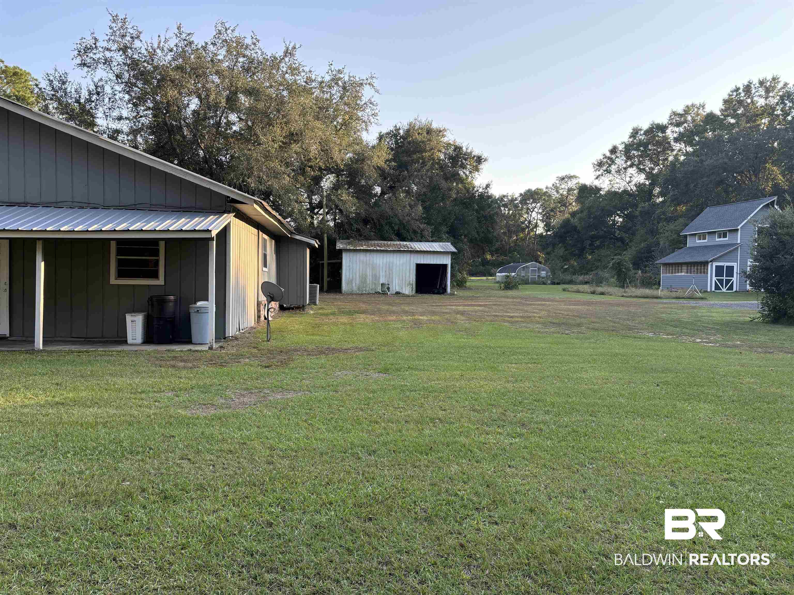 17495 County Road 48 Robertsdale, AL 36567 - Photo 8 of 37 View of yard featuring a shed