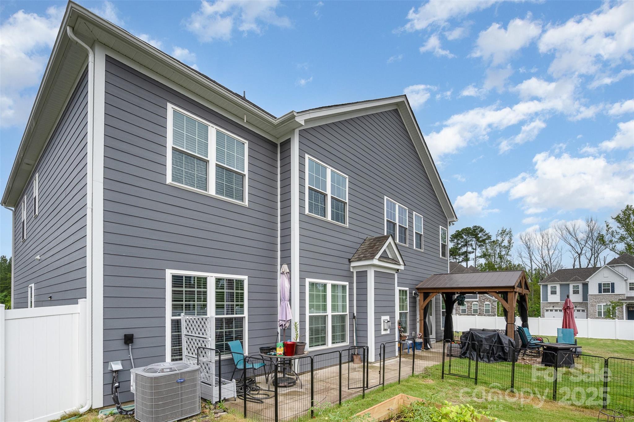 2960 Haley Circle Davidson, NC 28036 - Photo 23 of 31 a front view of a house with outdoor seating