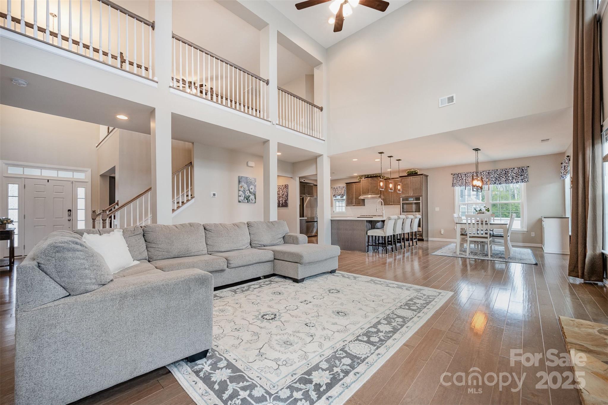 2960 Haley Circle Davidson, NC 28036 - Photo 9 of 31 a living room with furniture and wooden floor