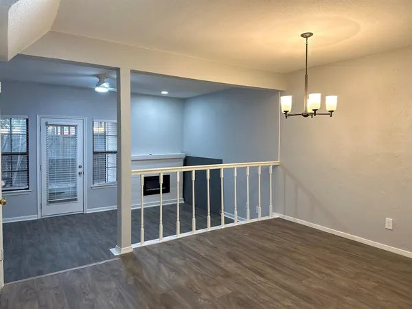 a view of a living room with entryway